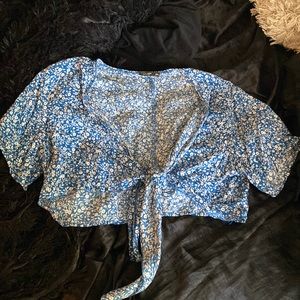 Cropped, tie in front shirt.